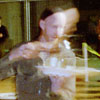 Hans Solbrig competes in the waiter obstacle course